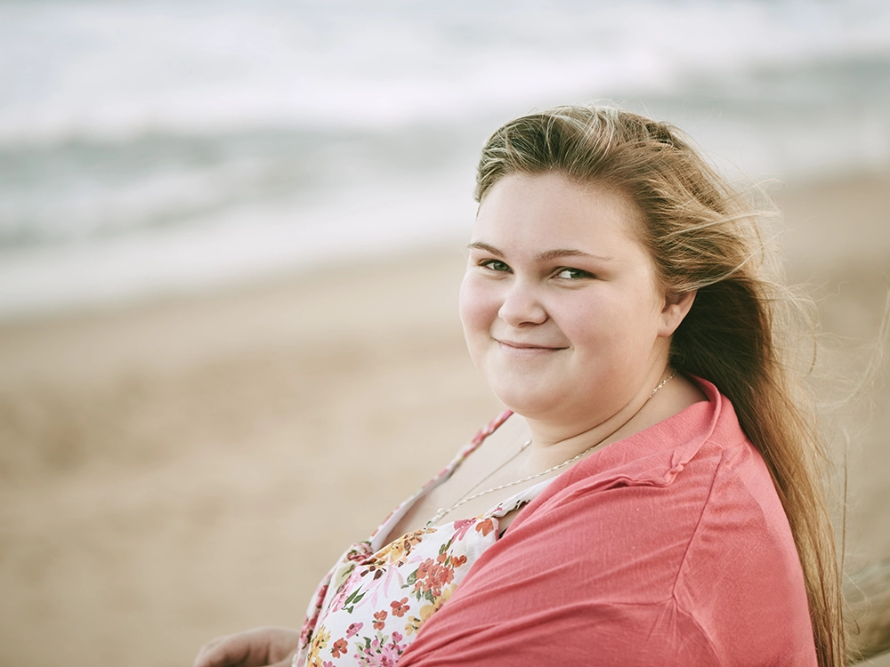 news-Foster teen in pink sweater.webp