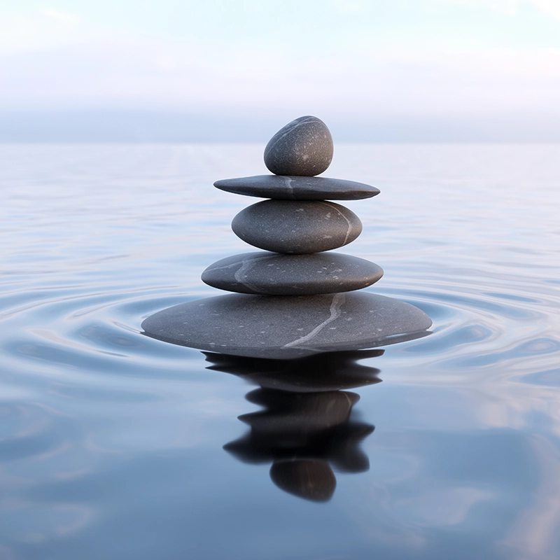 hero-stacked stones on water.webp