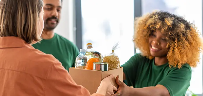 Health Worker Handing out Food