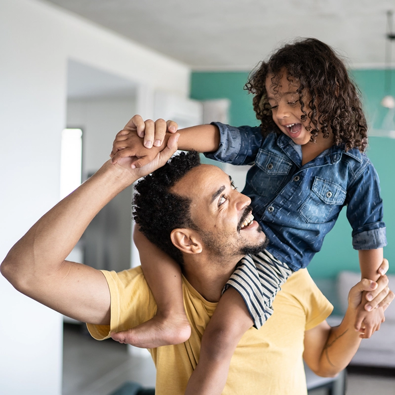 hero-father daughter on shoulders.webp