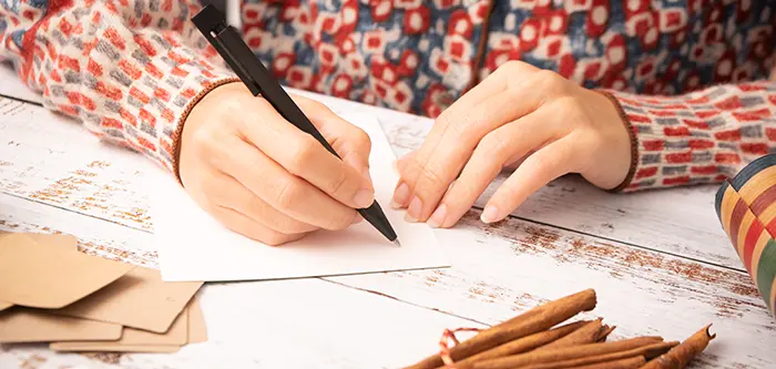 Hand writing holiday cards