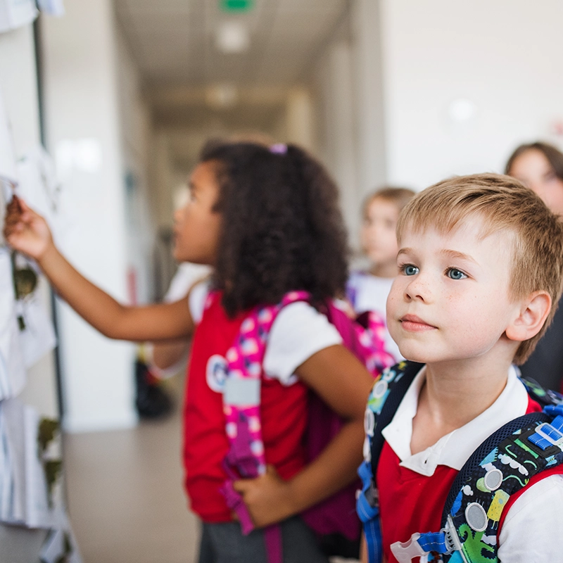 Hero-Young Boy and Girl in Background.webp