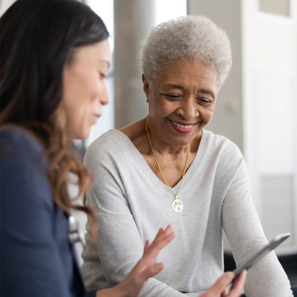 Provider helping patient sign up for PointCare