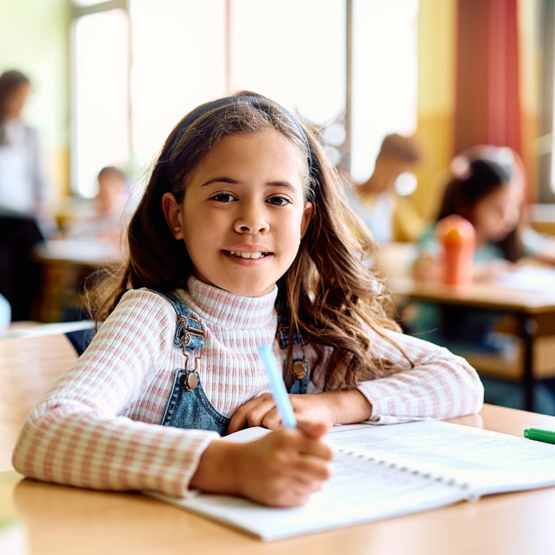 Hero-Girl at Desk with Pencil.webp